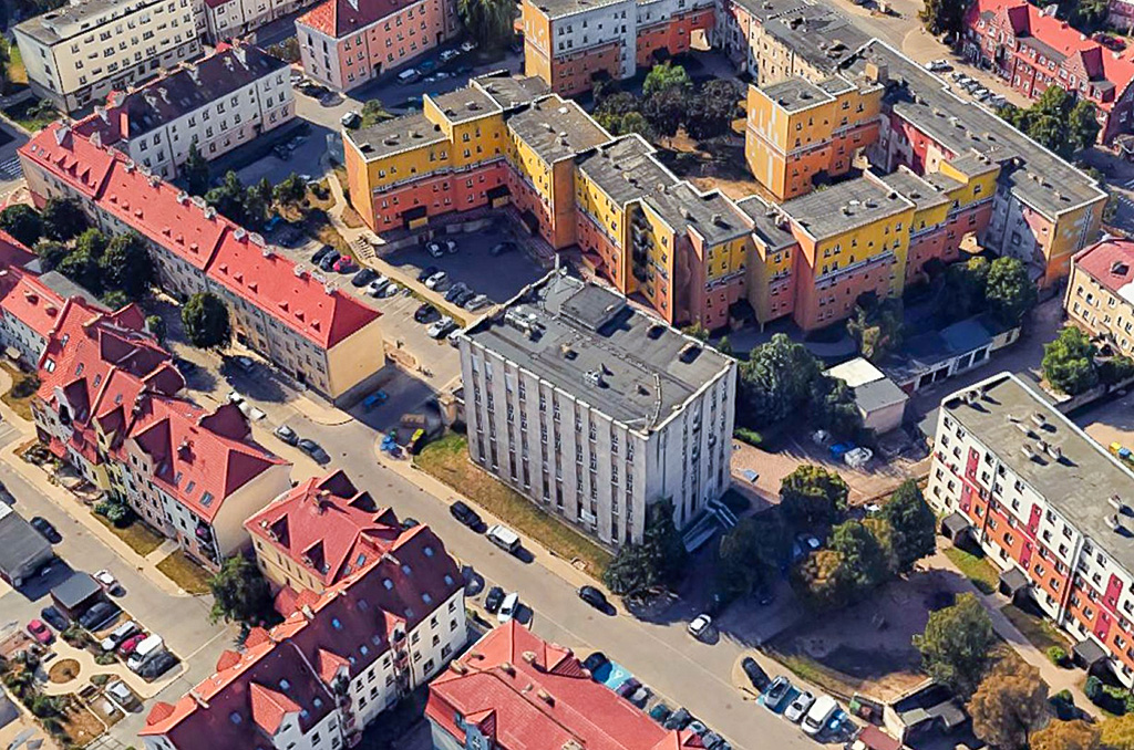 zdjęcie z lotu ptaka pokazujące od góry nieruchomość komercyjną na sprzedaż Ełk